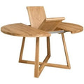 Table ronde extensible en chene massif 100 a 130 cm, style nordique moderne avec pieds croises et finition naturelle